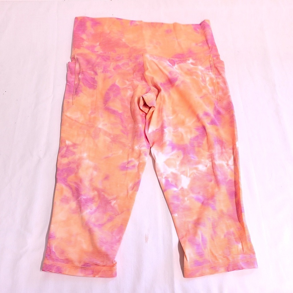 Athleta Salutation Stash Pocket II Capri Women 1X Pink Orange Tie Dye Leggings